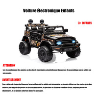 Garvee 12V Auto elettrica per bambini mimetica con sospensioni a molla, luci a LED, Bluetooth per viaggi avventurosi dai 3 anni