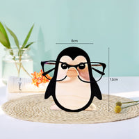 Supporto per occhiali Garvee, simpatico espositore per occhiali da sole a forma di animale, realizzato in legno per camera da letto, ufficio, scrivania, pinguino