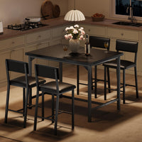 Set da pranzo Garvee per 4 persone con poggiapiedi e protezioni angolari, altezza bancone, sgabelli da bar imbottiti, struttura in metallo, piano in legno, compatto, per cucina e appartamento, multicolore