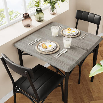 Set da pranzo Garvee per 2 persone con sedie imbottite, tavolo da cucina grigio rustico, MDF e acciaio, salvaspazio, per stanze e appartamenti di piccole dimensioni