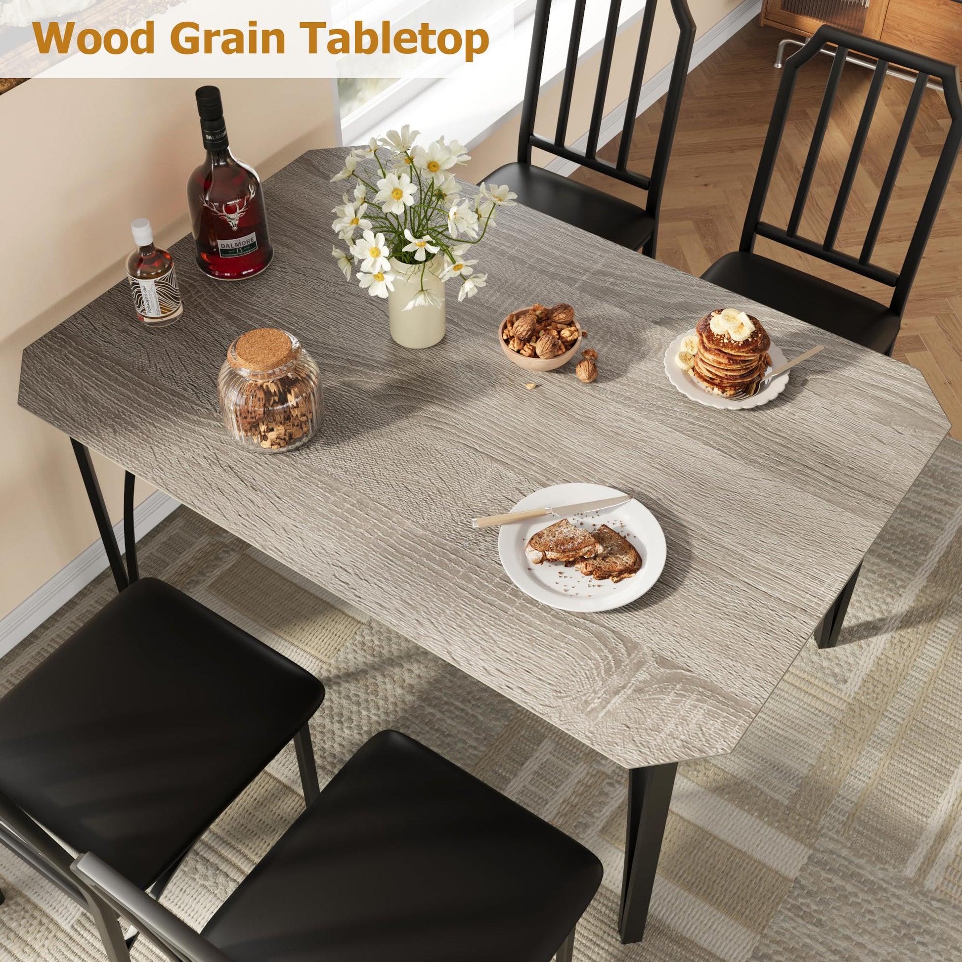 Set da pranzo Garvee per 4 persone con design smussato, cuscini di seduta in PU, MDF e acciaio, compatto, robusto, adatto a piccoli spazi, nero
