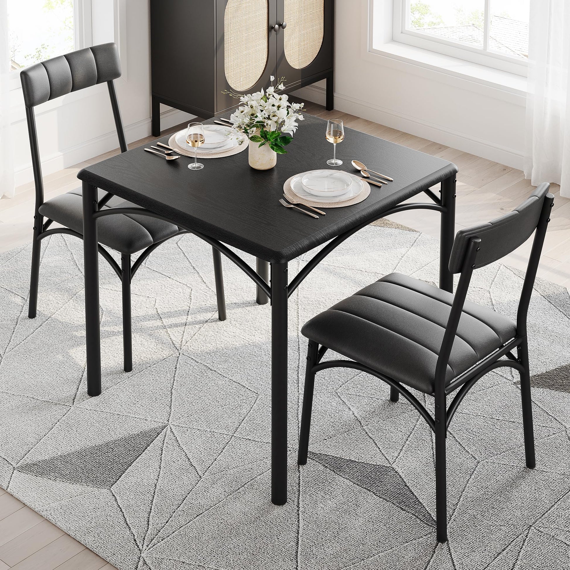 Set da pranzo Garvee per 2 persone con sedie imbottite, MDF robusto e acciaio, nero rustico, salvaspazio, per stanze piccole