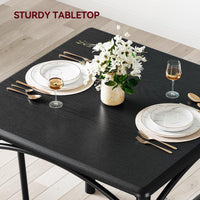 Set da pranzo Garvee per 2 persone con sedie imbottite, MDF robusto e acciaio, nero rustico, salvaspazio, per stanze piccole